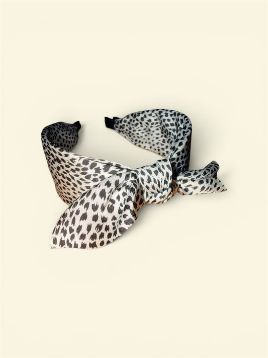 White spotted print twist bow