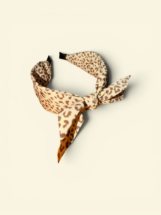 Brow cheetah print twist bow