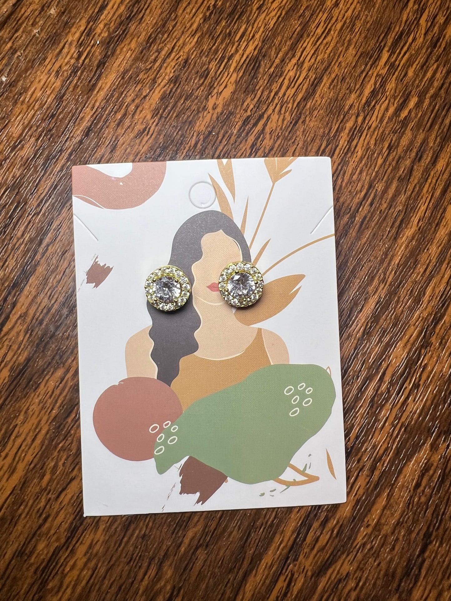 Gold stud earrings